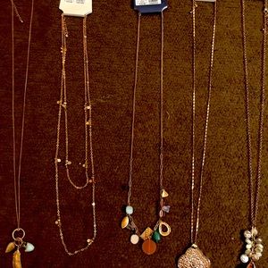 NEW. Extra long necklaces.